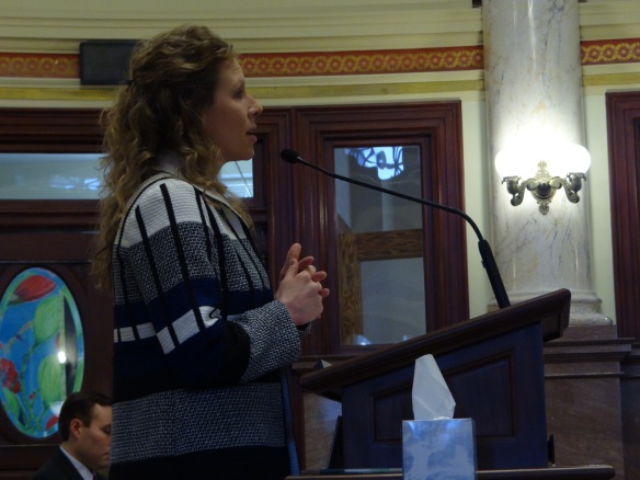 Concussion survivor Julia Hammond speaks to the Senate Judiciary Committee Friday